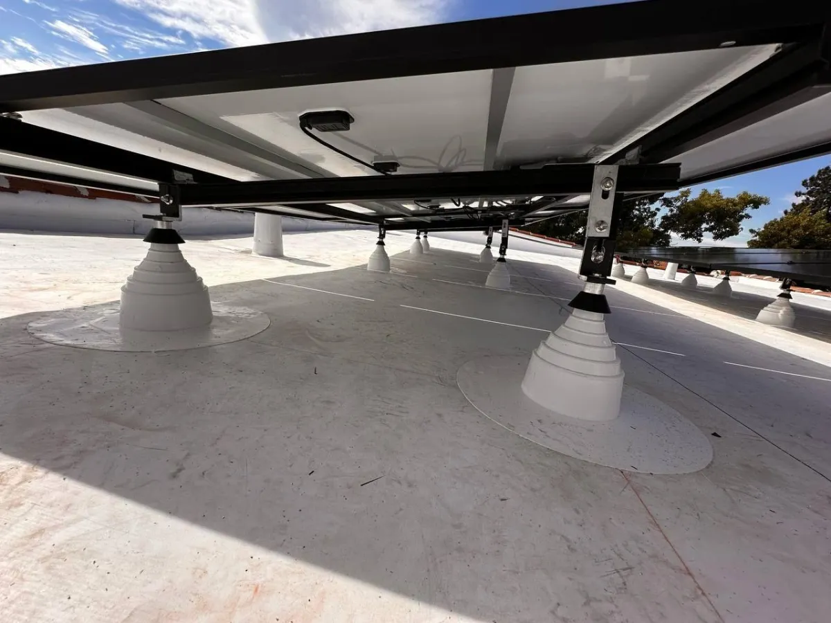 Solar tilt mounts on flat roof