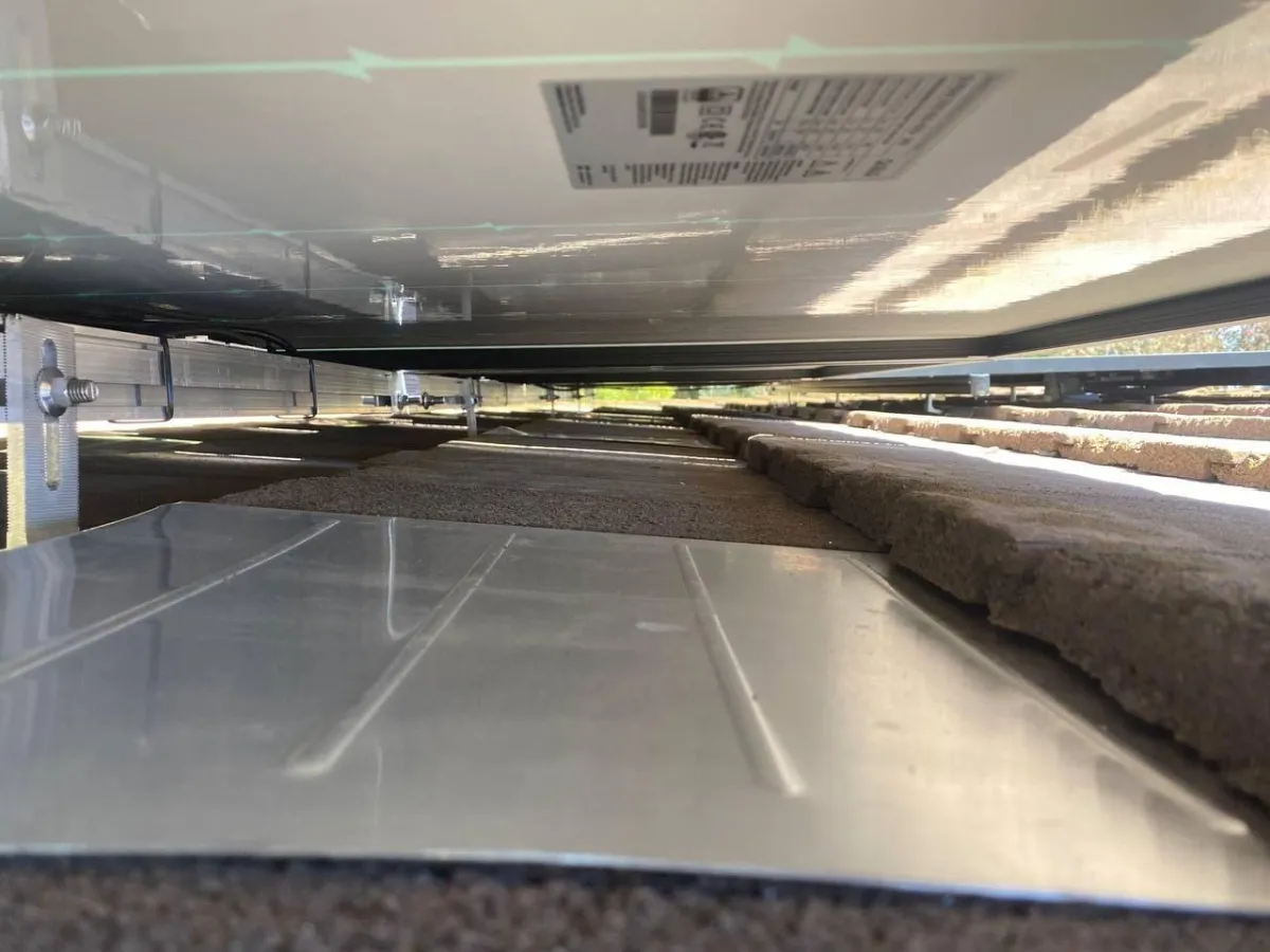 Water proof flashing for custom flat tile solar 