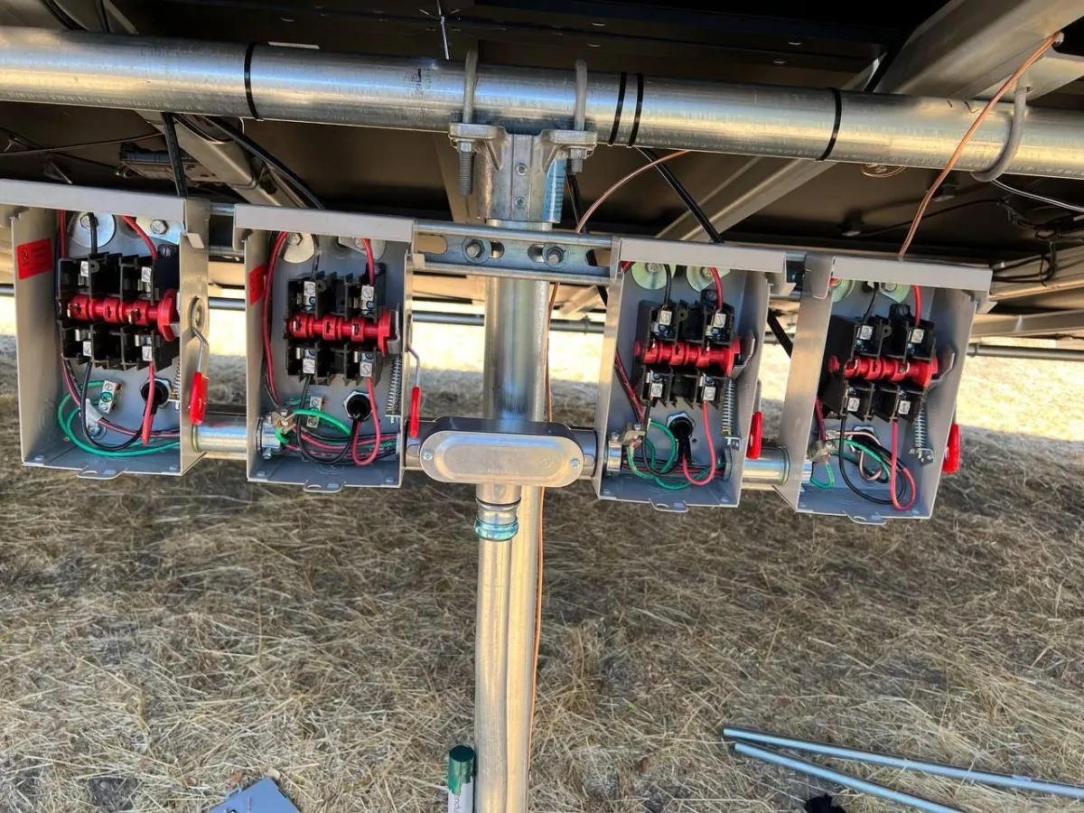 Electric junction boxes for ground mounted large solar array