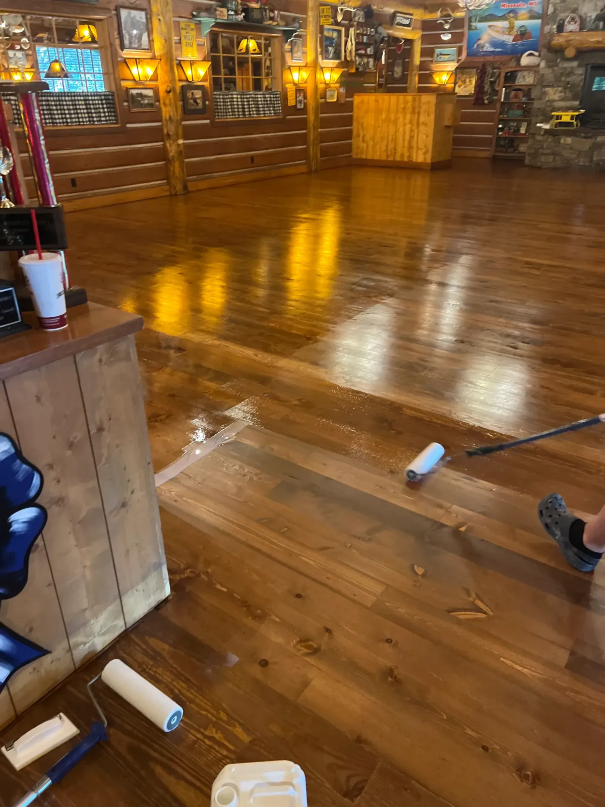 Wood floor recoating in Missoula MT – applying fresh protective finish to restore shine without full sanding