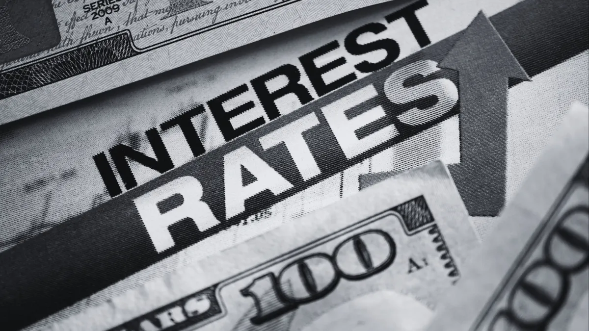 interest rates next to 100 dollar bill
