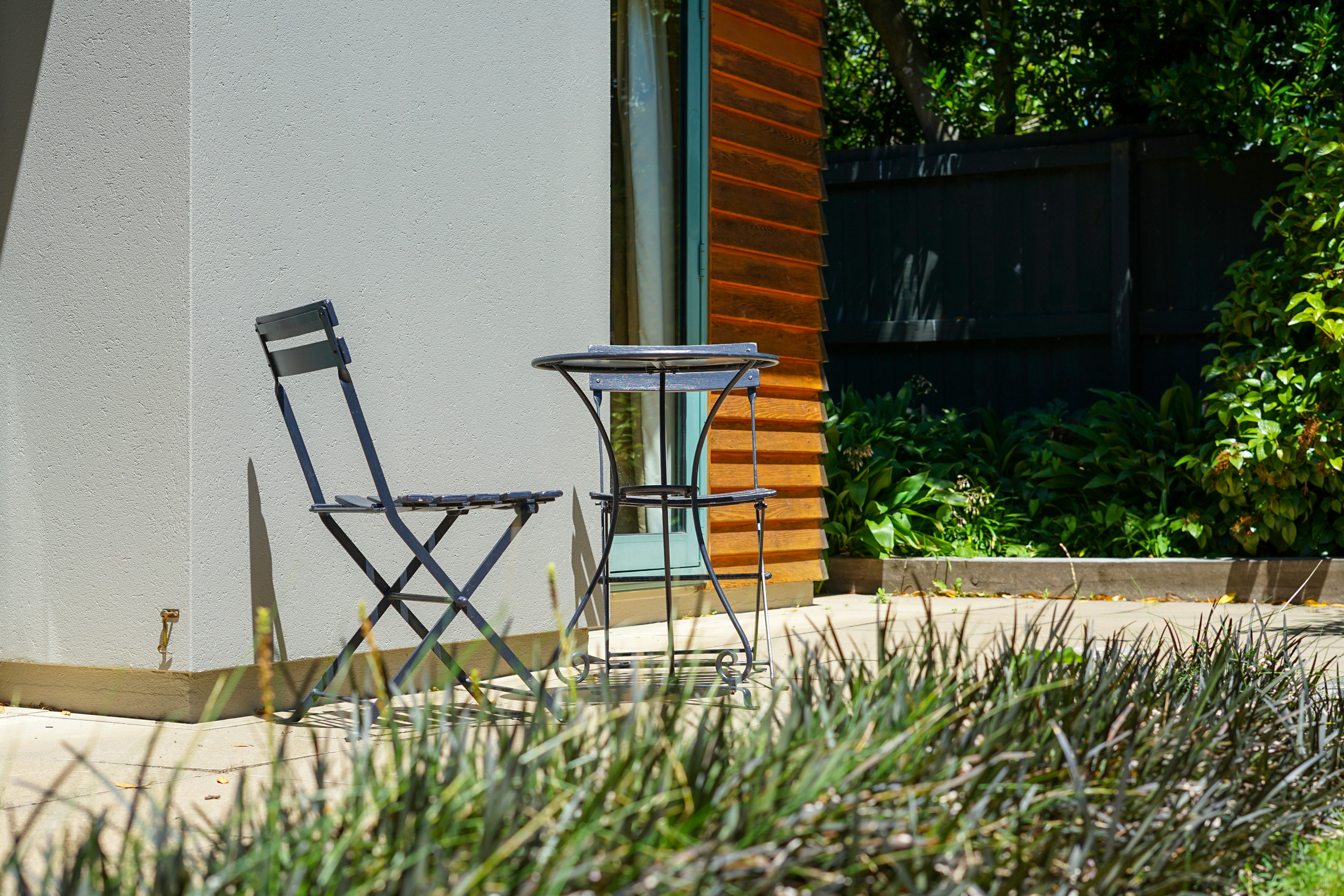 chair and table on a concrete patio