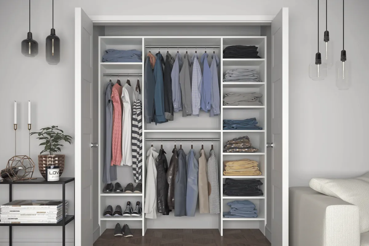 High-heeled shoes neatly arranged on shelves in a white closet
