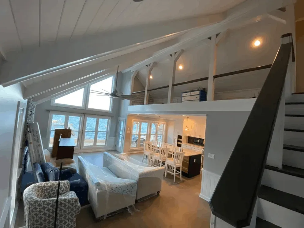 Remodeled Jacksonville kitchen with sleek cabinetry, granite countertops, stainless appliances, and warm hardwood flooring.