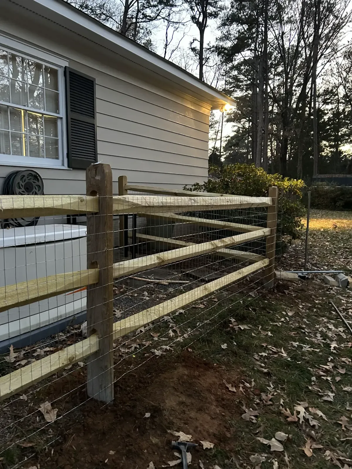 a fencing company hard at work