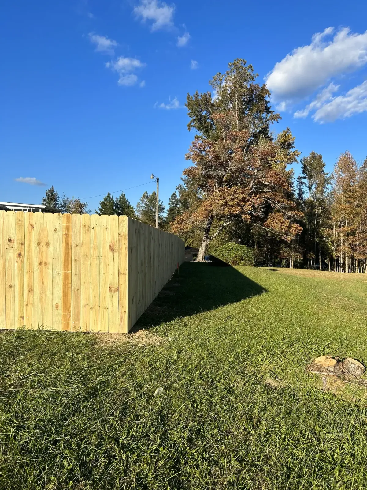 fencing company putting up fence