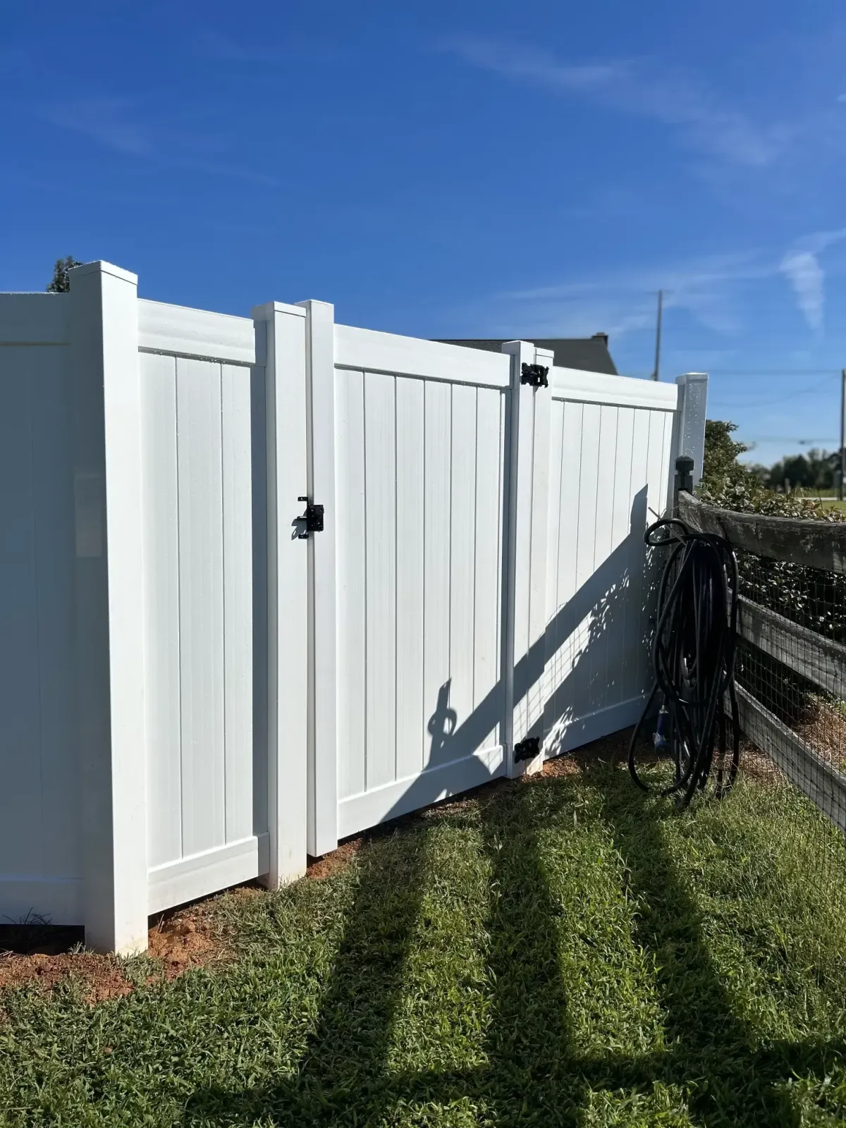 fence installers installing a fence