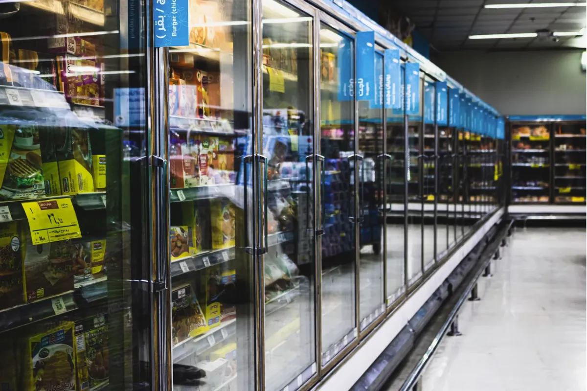 Commercial glass refrigerator in a grocery store