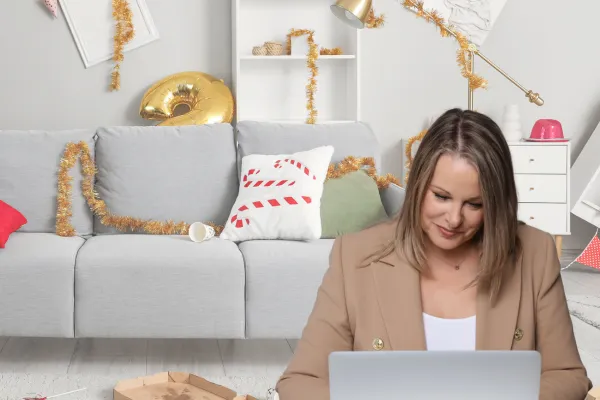 A woman lost in writing stories despite all the chaos going on behind her