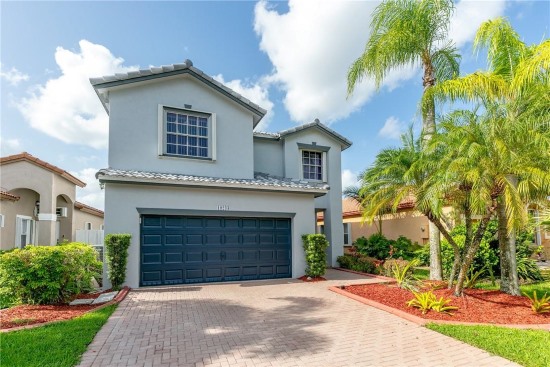 A large red building sitting on the side of a road
