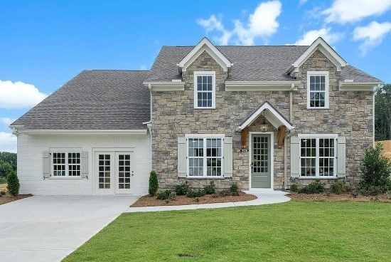 A large red building sitting on the side of a road