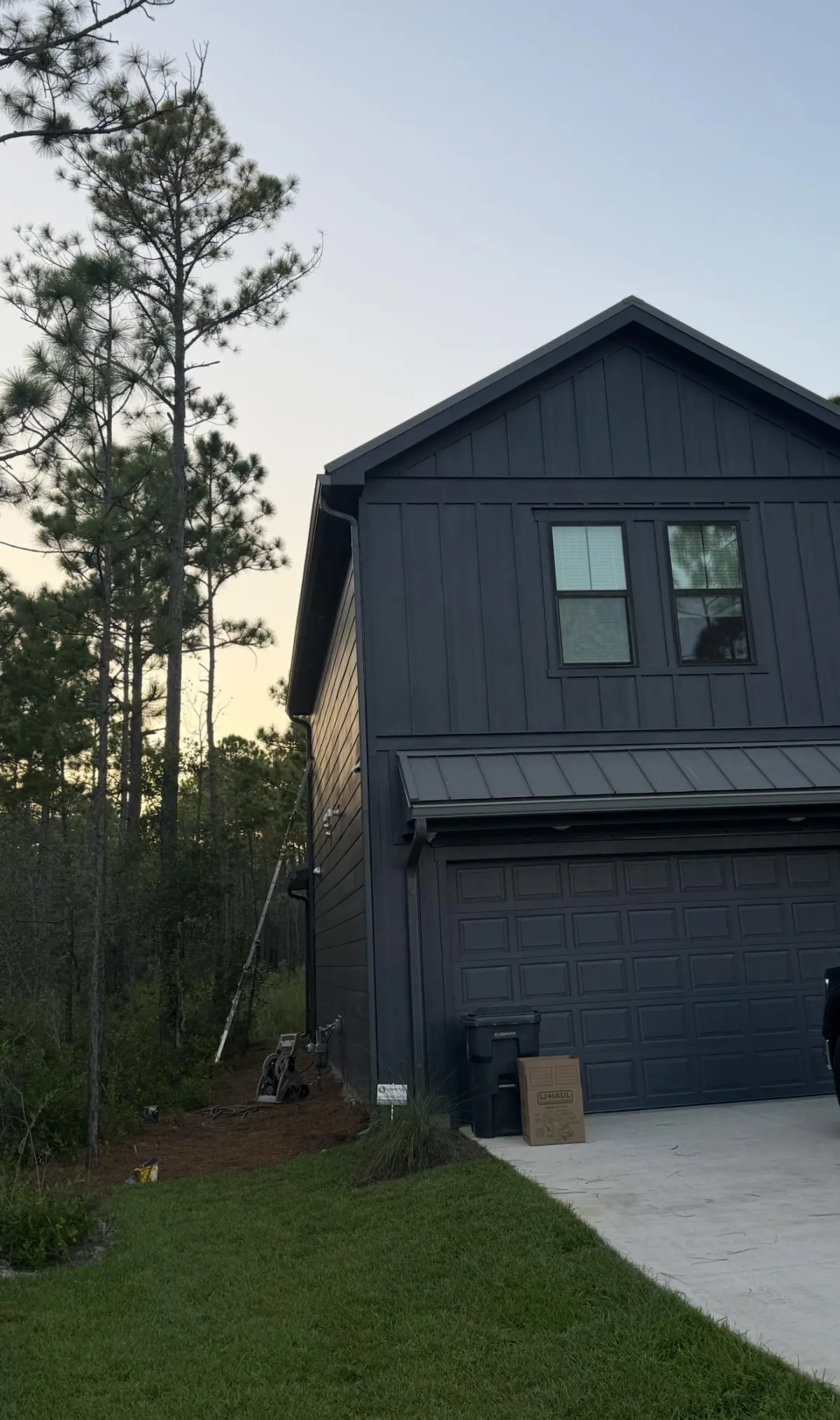 a red tiled roof with ivy growing on it