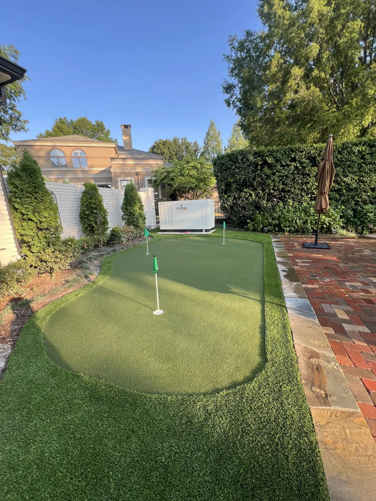 Custom backyard putting green installation in Memphis TN