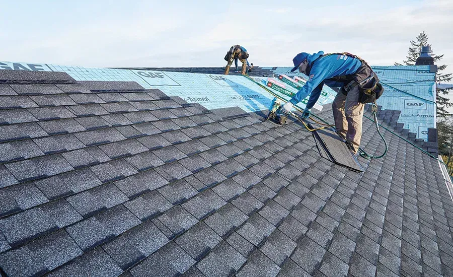 a person's hand on a bicycle tire