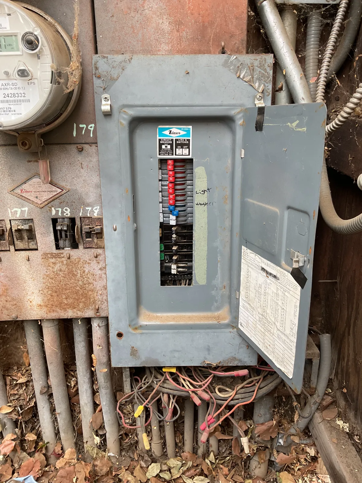 several assorted power switches mounted on white wall