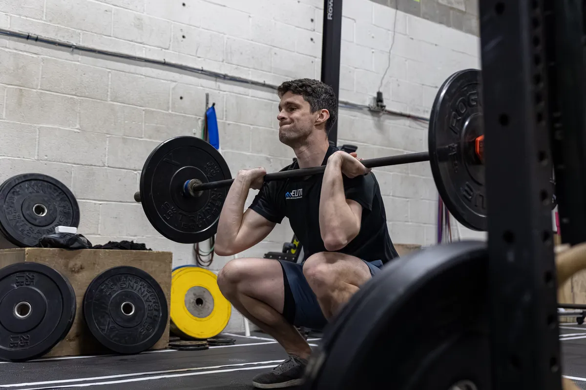 Zach at CrossFit working on Thrusters