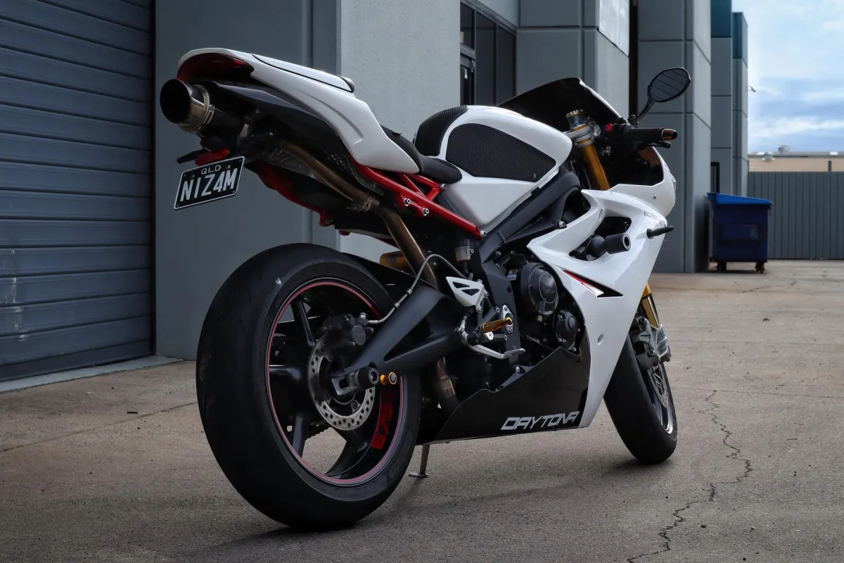 Applying ceramic coating results in a flawless, durable finish that enhances shine and protects your bike's exterior.