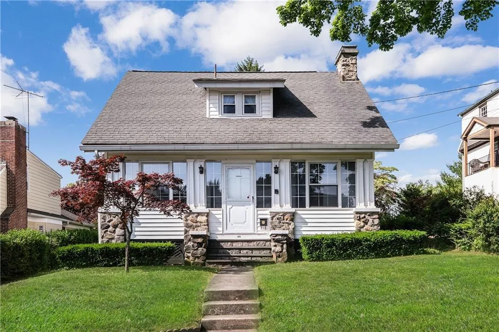 a rendering of a modern house with palm trees