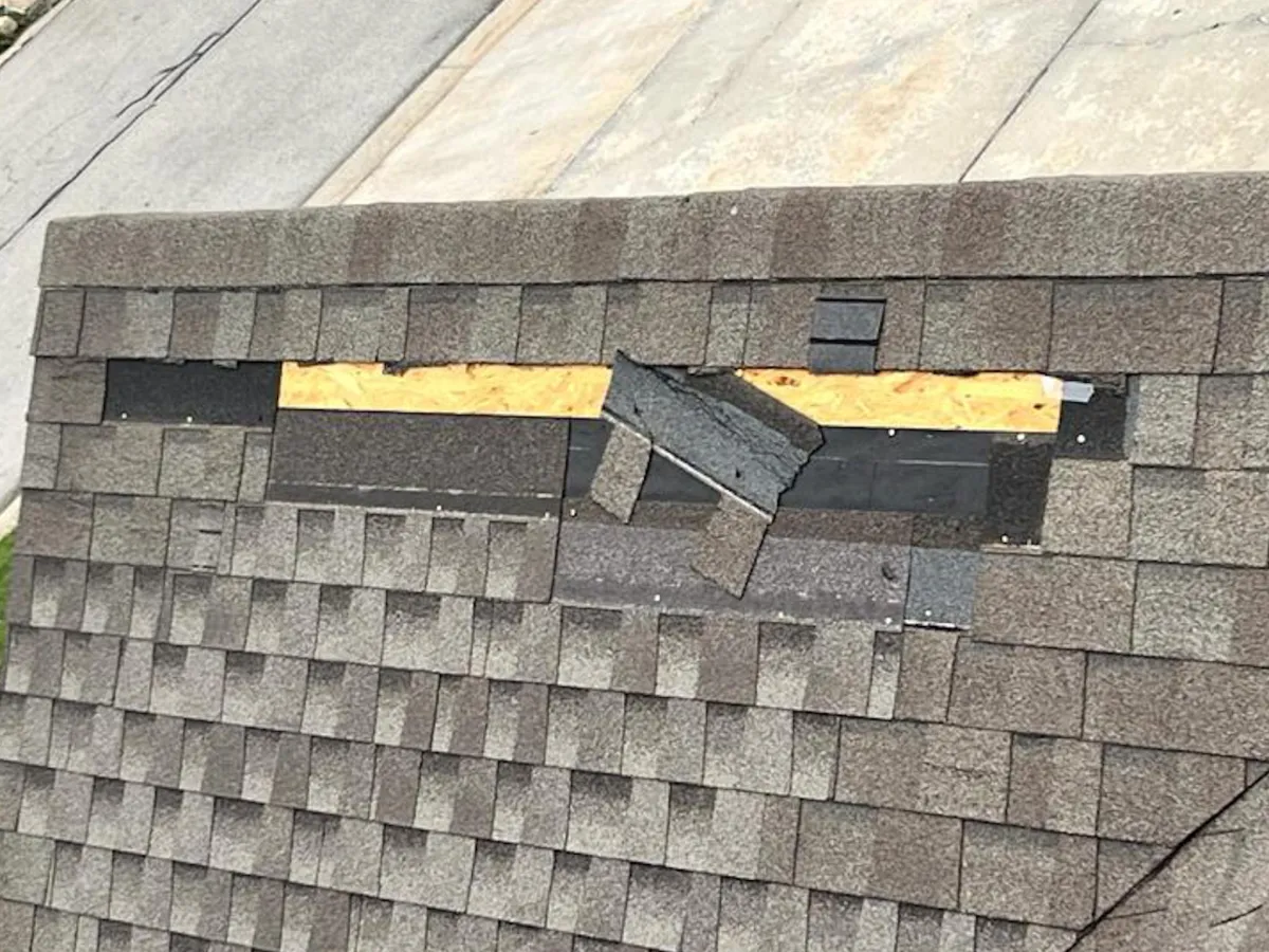 roof with broken shingles