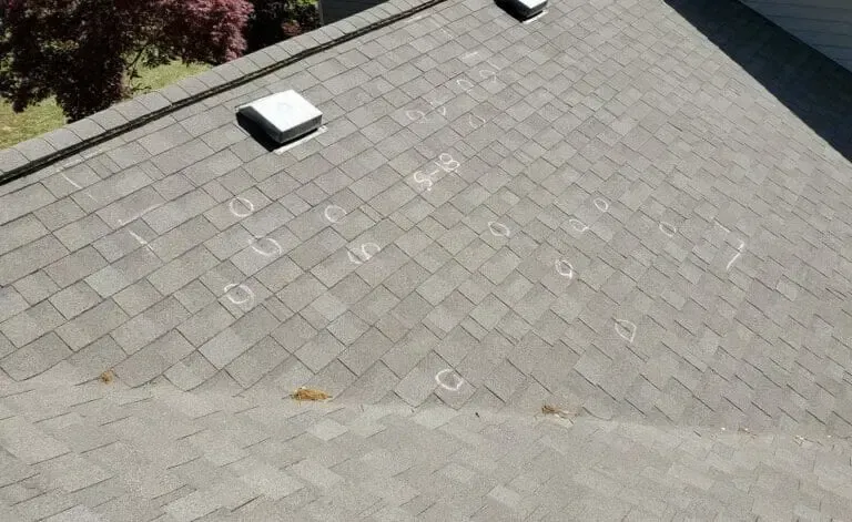 roof with circle marks from storm damage