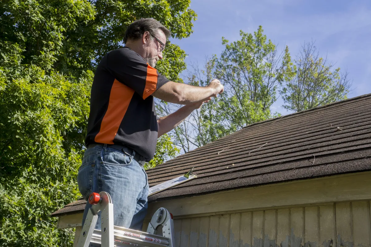 Tulsa roofing contractor documenting roof inspection photos