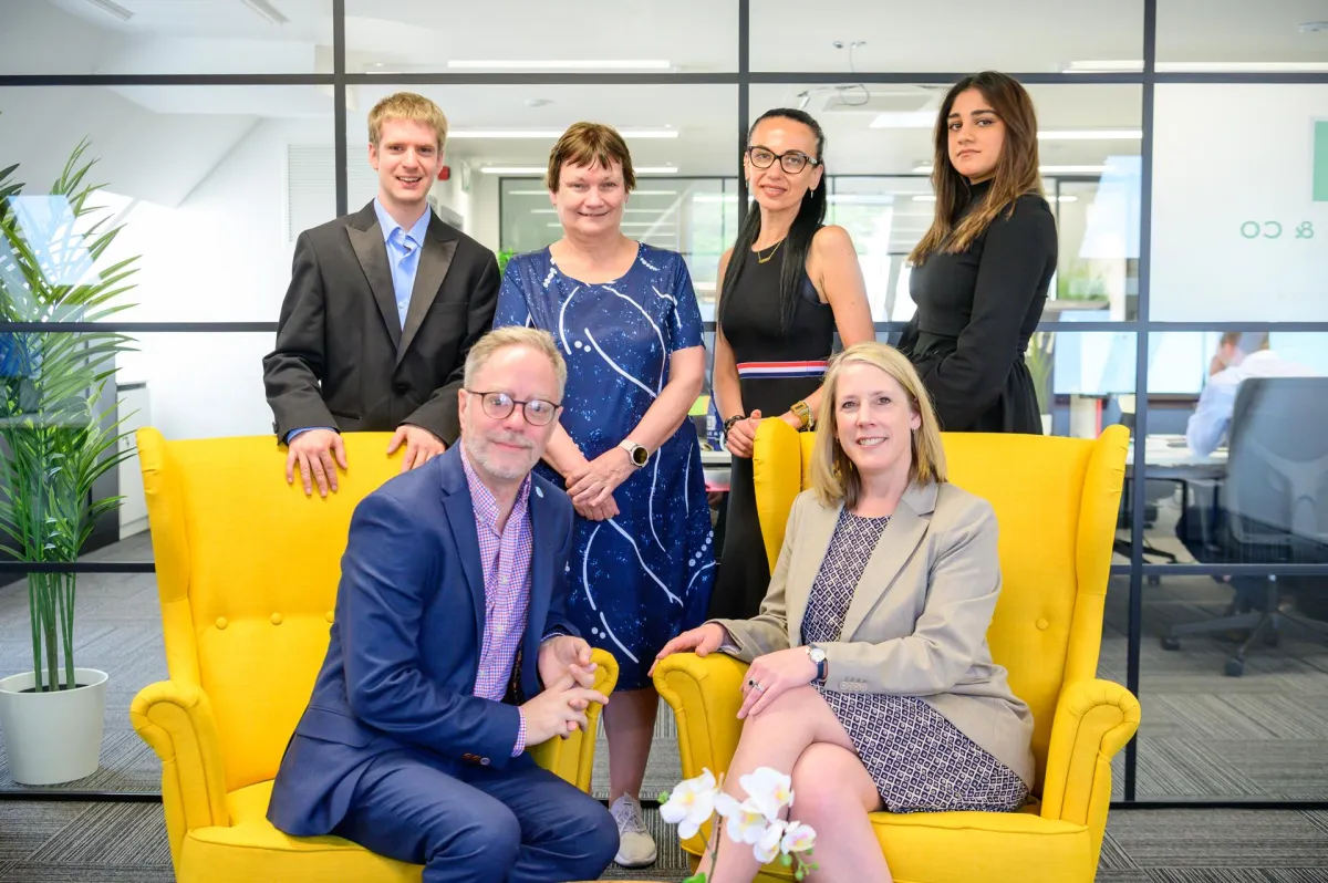 books on brown wooden shelf