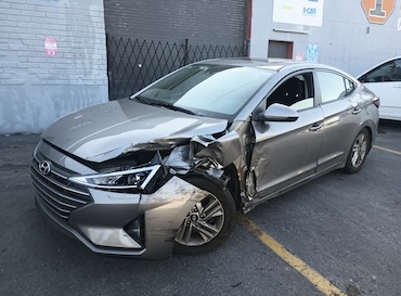 woman placing sticky notes on wall