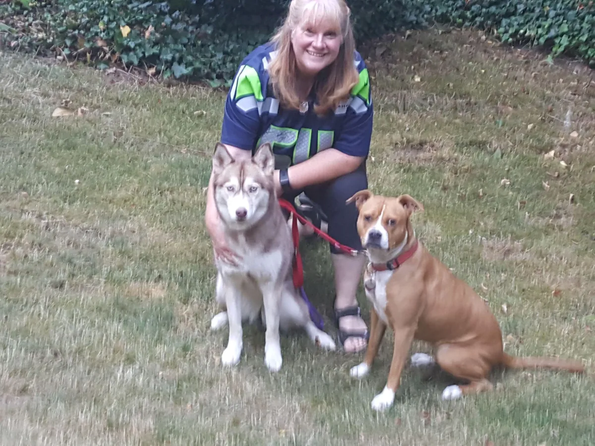 Kat the trainer with her two dogs