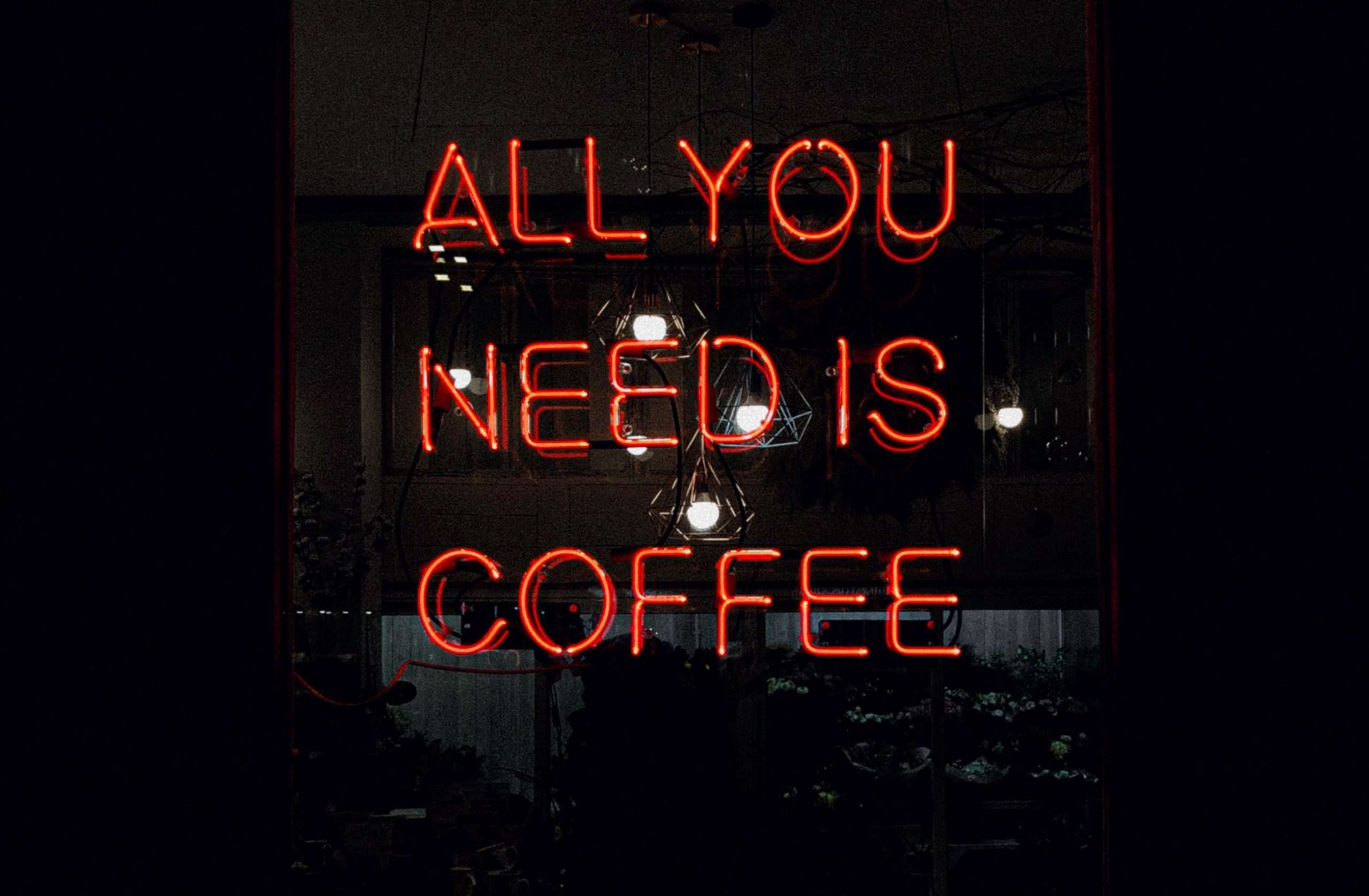 All you need is coffee typography graphic, ideal for coffee shop decor, café signage, or office breakroom inspiration.