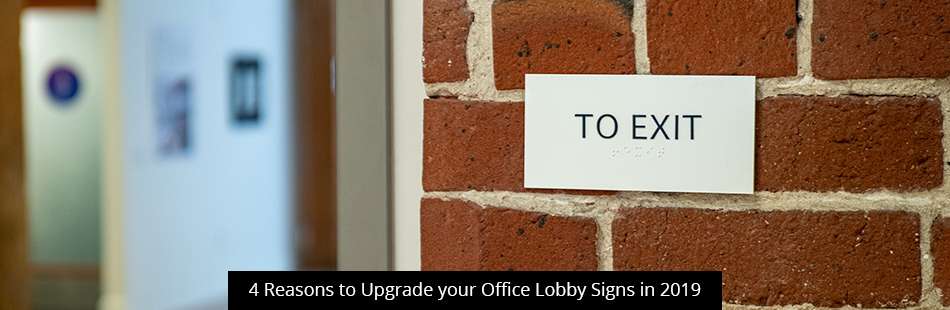 A red and white sign with the text "TO EXIT" above a headline that reads "4 Reasons to Upgrade your Office Lobby Signs in 2019."