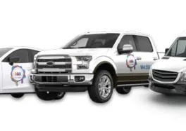 Balson company fleet vehicles: white Mazda sedan, Ford pickup truck, and Mercedes-Benz van with company branding