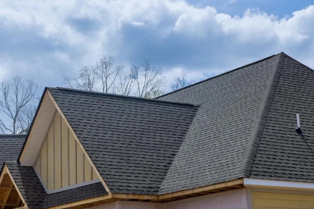 Eco-friendly roof design featuring sustainable materials in Western NH, provided by Olsen’s Roofing.