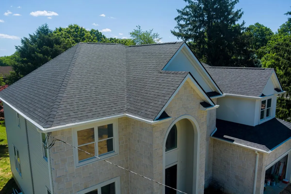 Classic shingle roof on a home in Bow, NH and the Greater Concord Area, installed with expertise by Preferred Electrical Services, LLC.