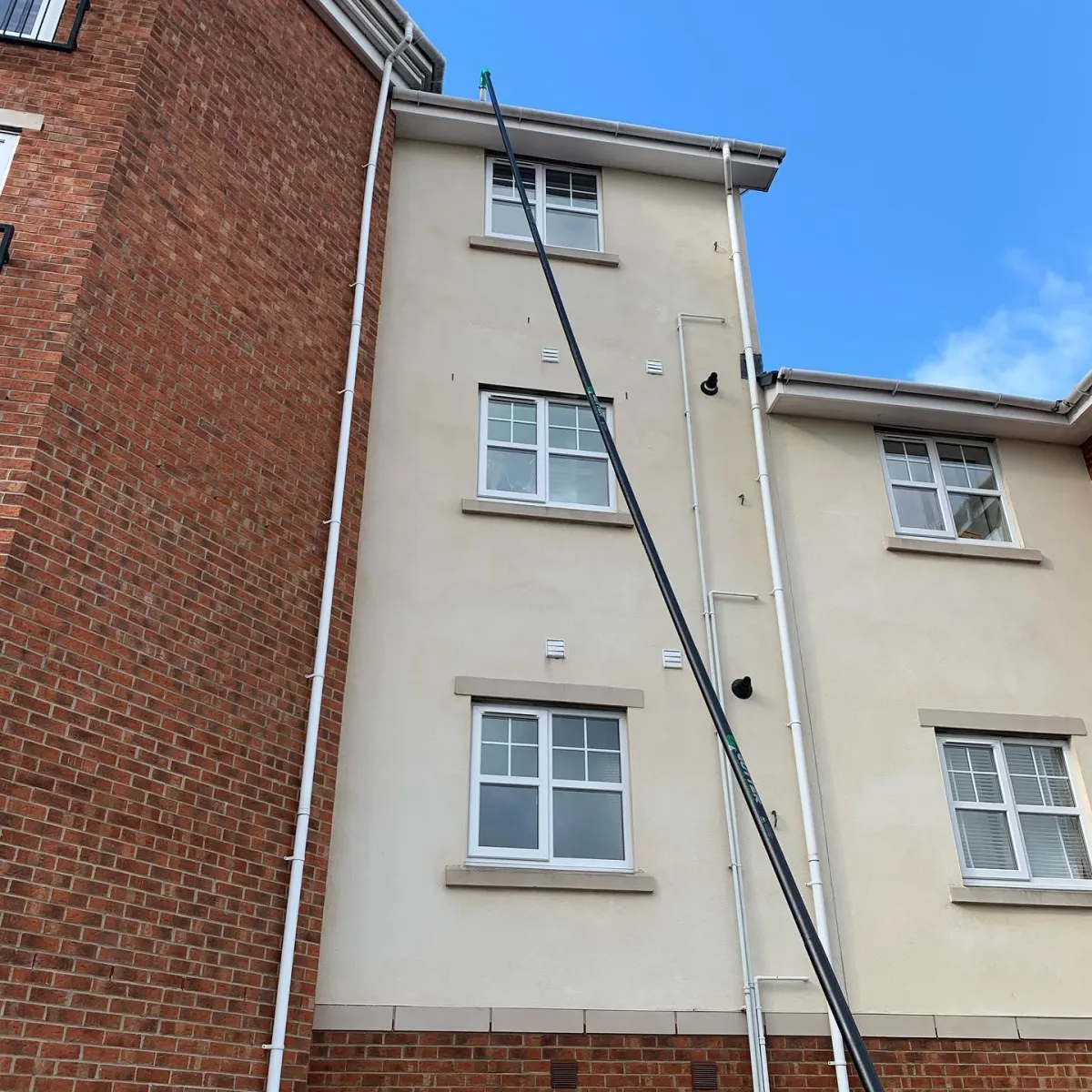 Gutter cleaning up a tall building 