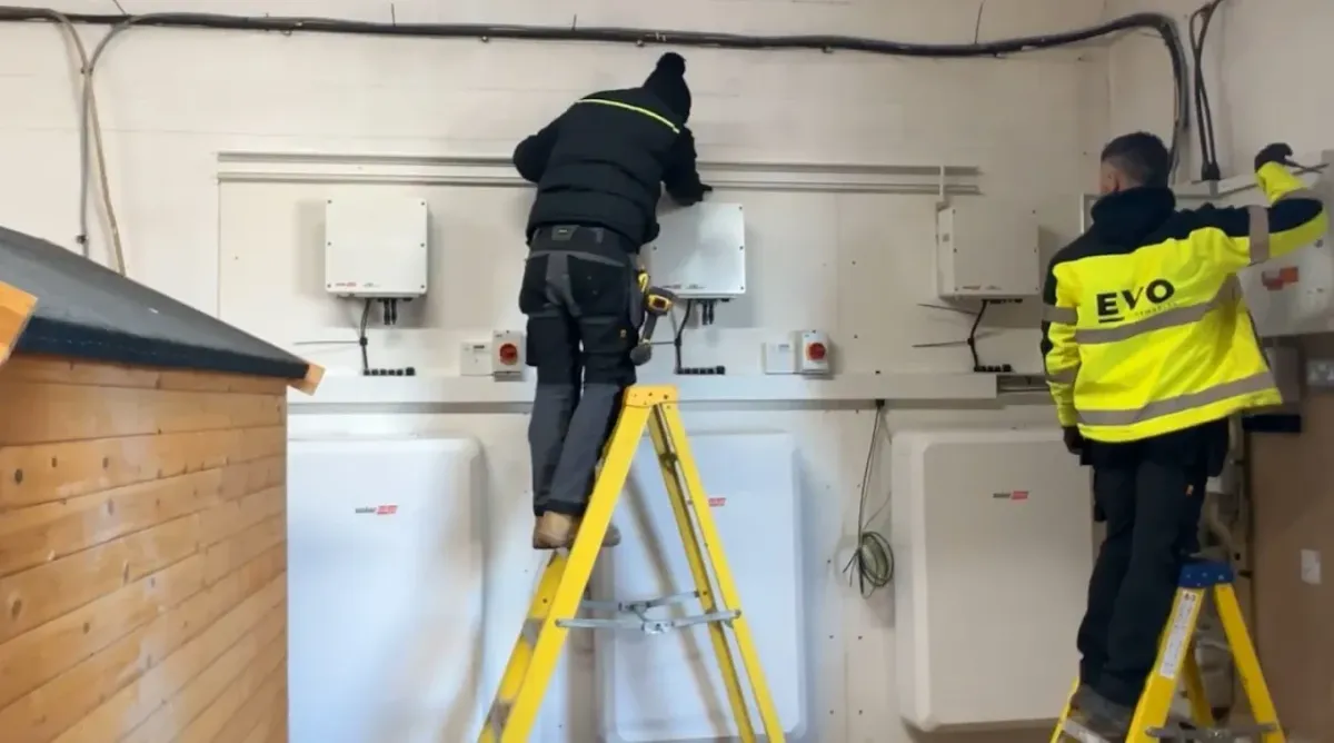 Image of team members working 