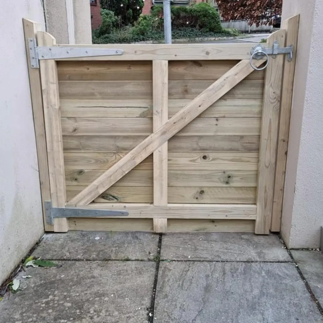 pair of gates made by king wood projects in saltash