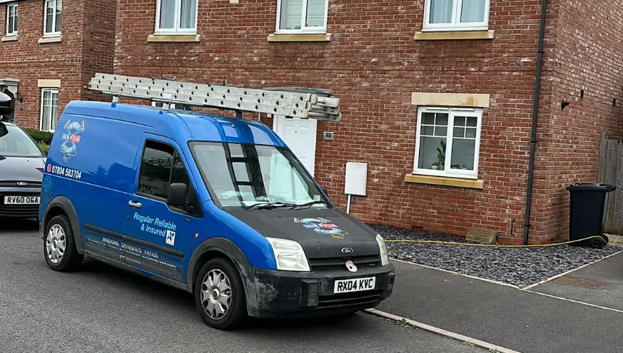 fresh n clean window cleaners van infront of house