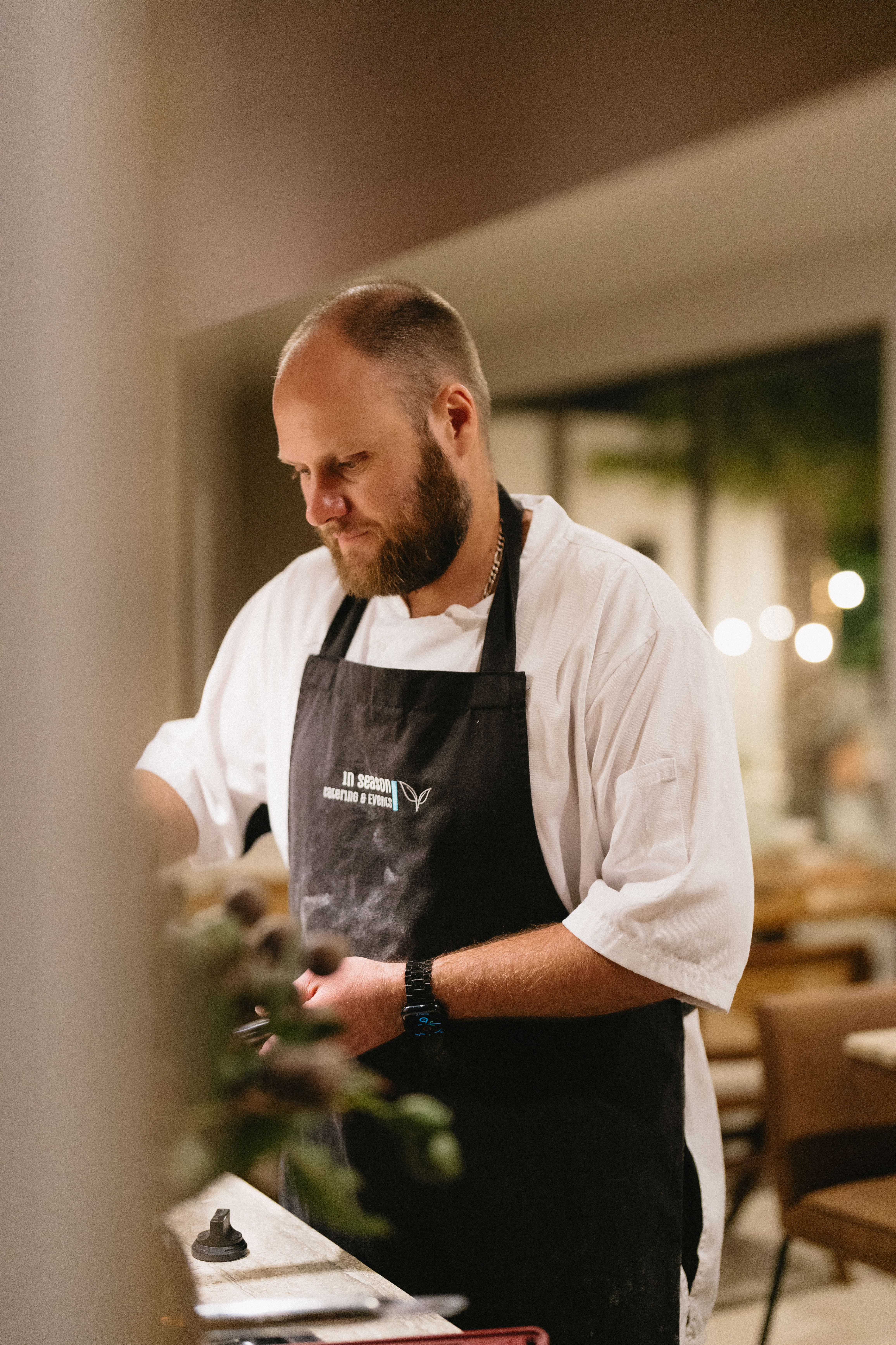 Owner and Executive Chef Craig Weston plating a dish