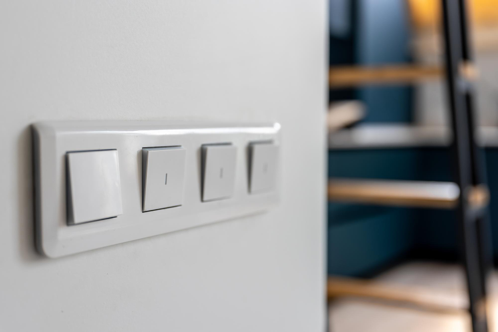Close-up of light switches installed during an office renovation