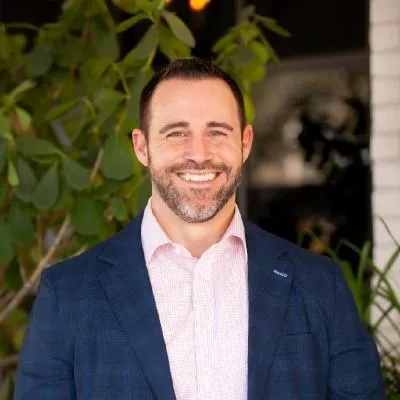 professional middle aged man smiling that overcame porn addiction
