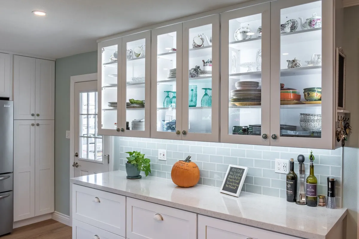 Close view of glass-front display cabinets with interior lights