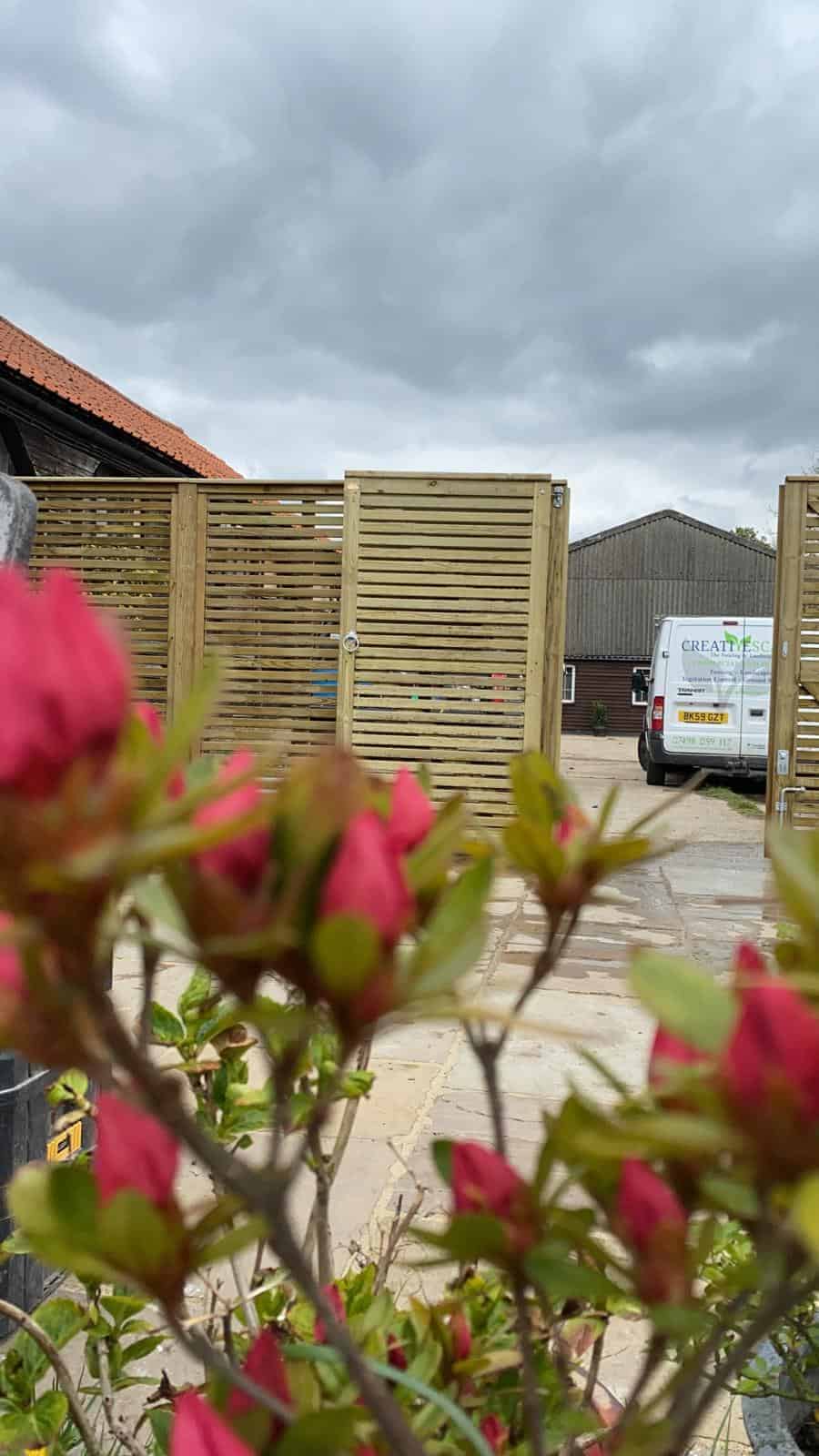 Venetion slatted fencing installation for a modern garden in Bicester