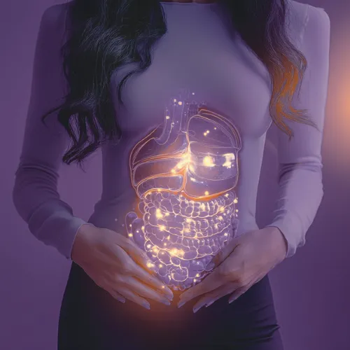 A metal ruler with black markings lies on a surface.