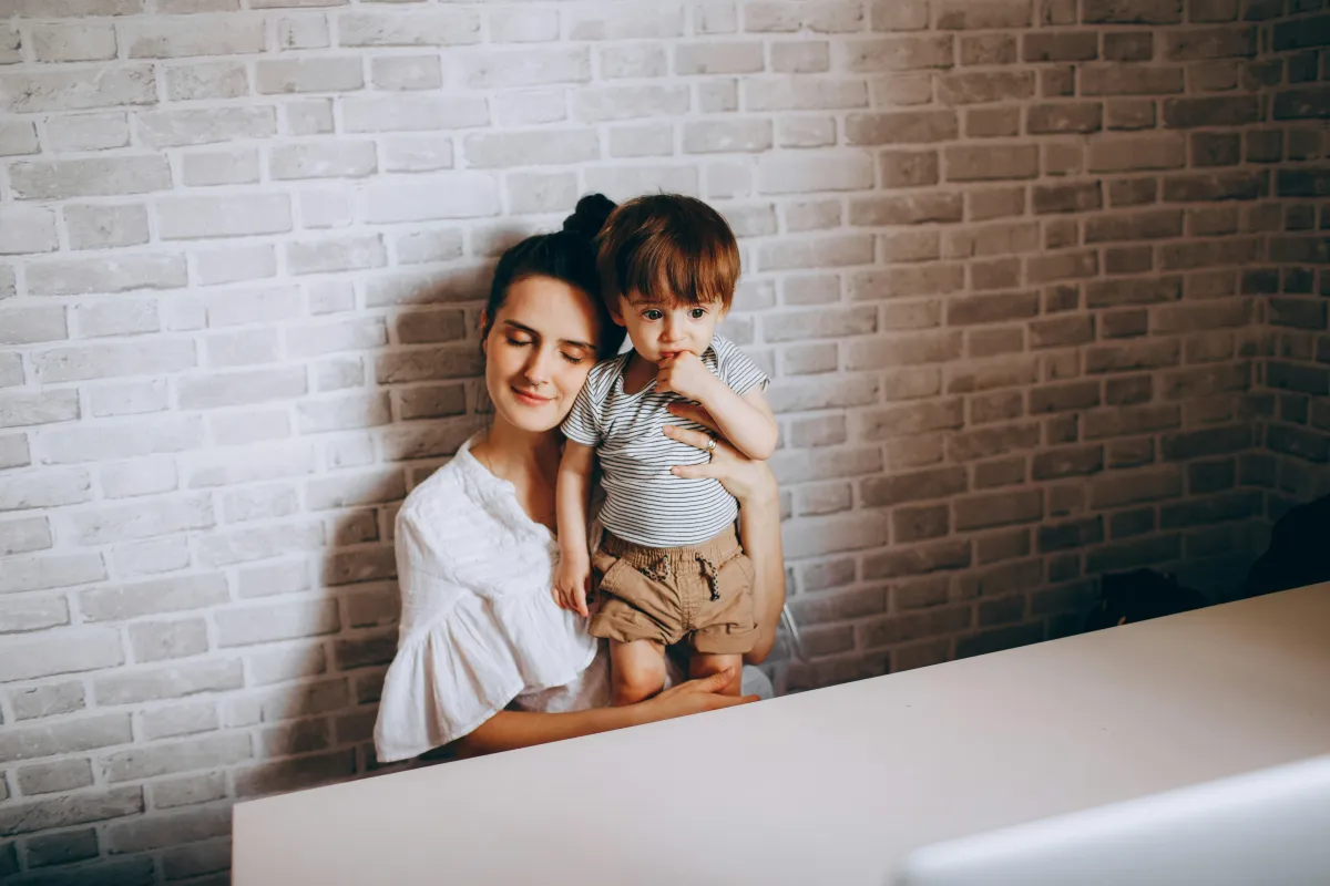 mum and her son, feelig tired for the overwhelm and mental load of motherhood but still wanting to show up at her best. 