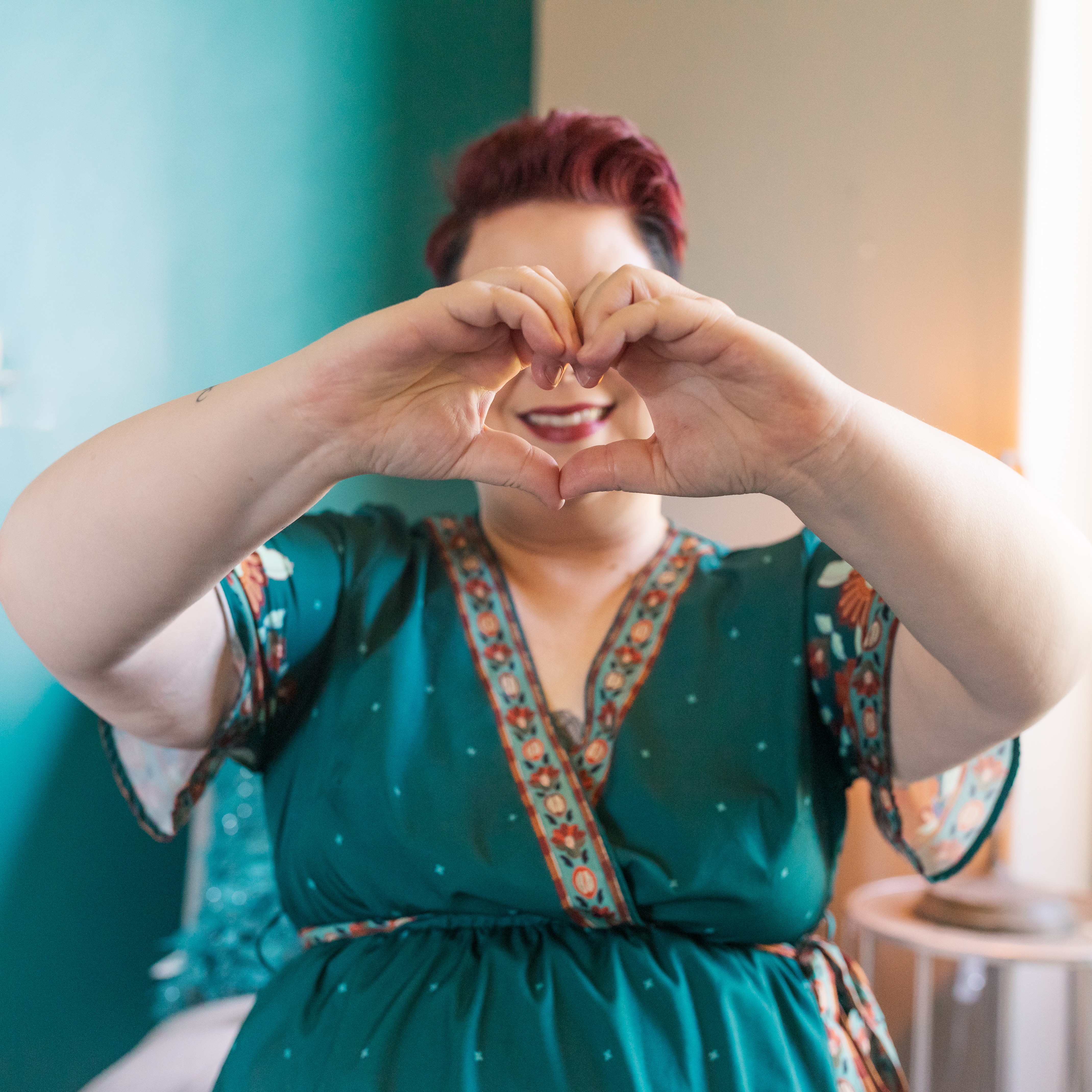 Elaine Turso giving heart sign