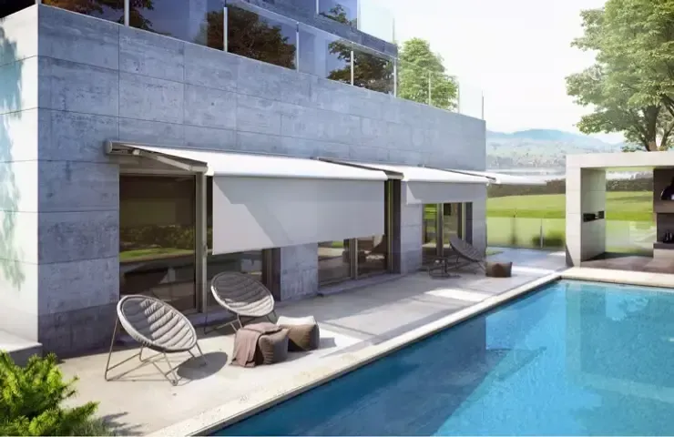 Modern white retractable patio awning installation next to a residential pool in Laguna Niguel, CA