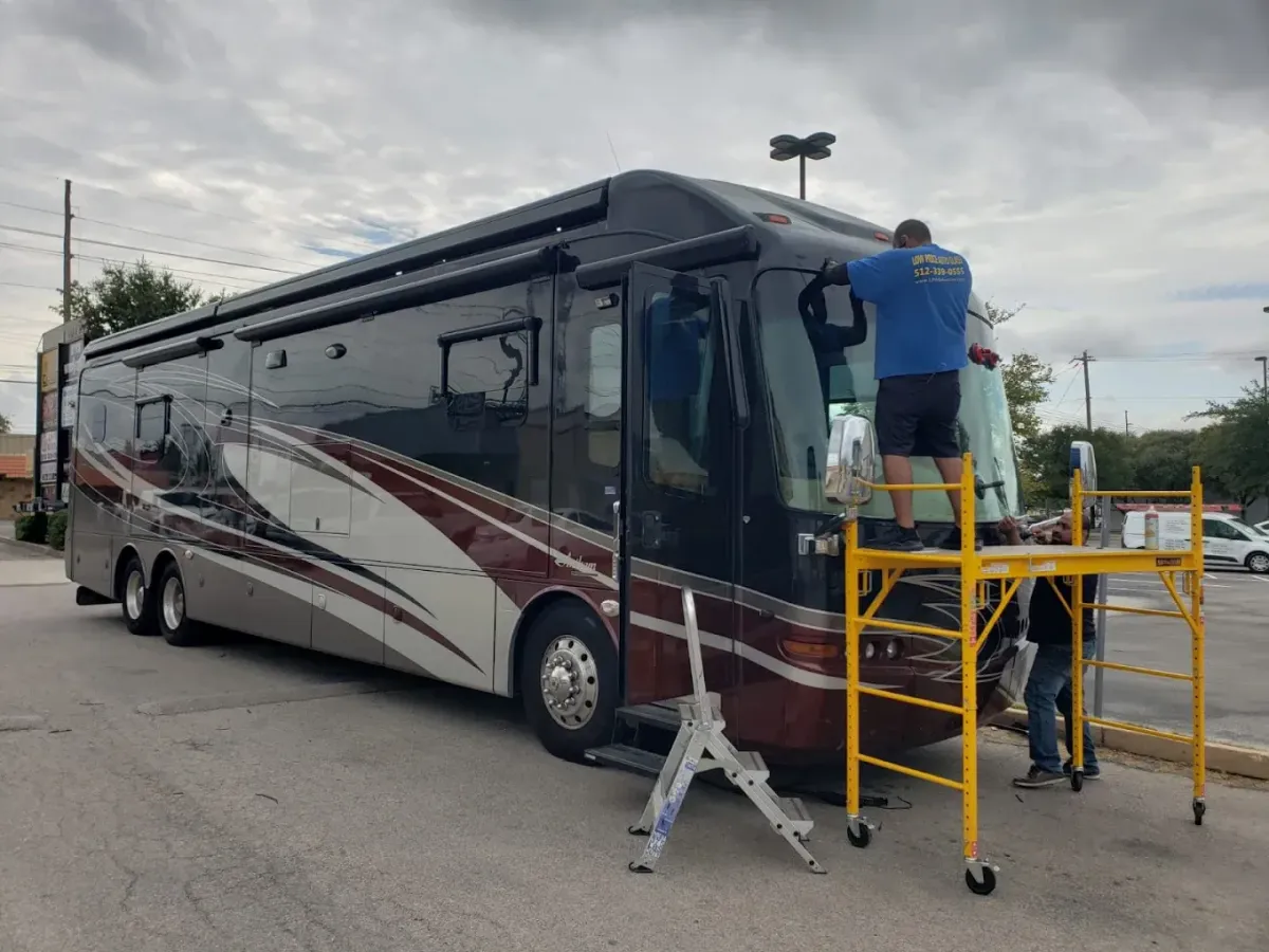 person holding green and white plastic bottle