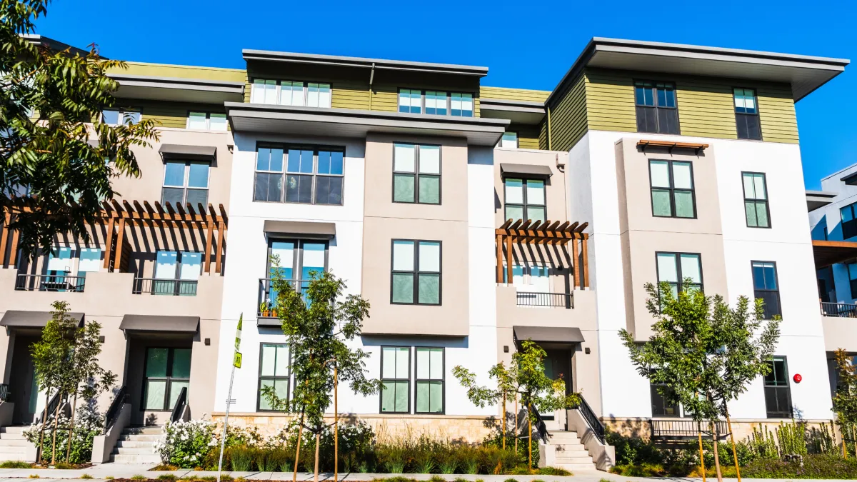 Professional painting of commercial apartment building for a clean, modern finish