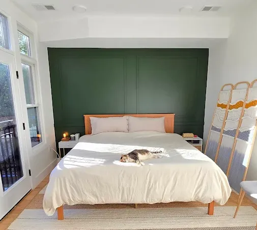Cozy bedroom with smooth, calming wall paint finish done by expert interior painters