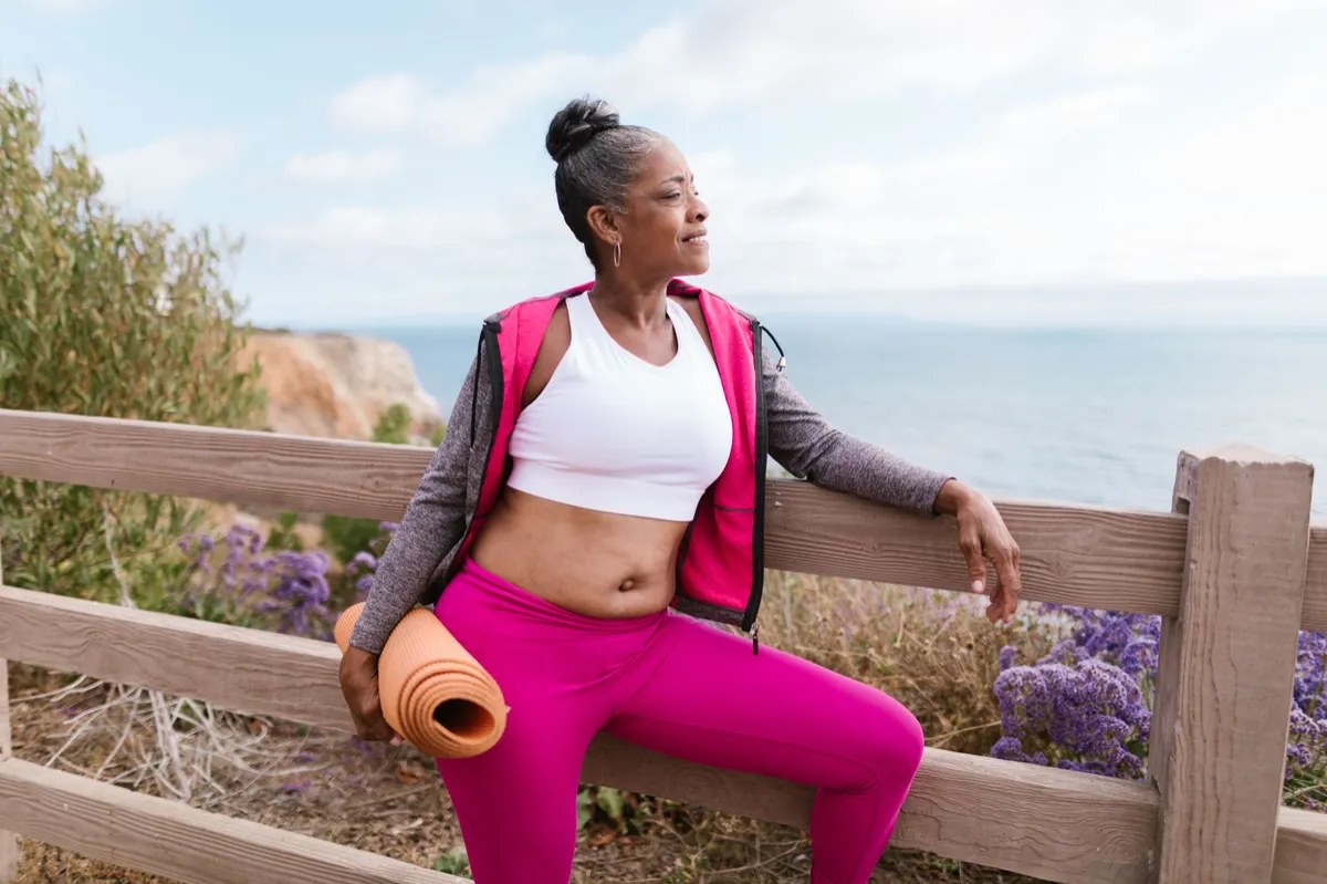 Middle-aged woman outdoors to support metabolic health